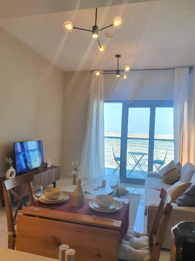 Cozy 1-bedroom apartment in Dubai South with Pool